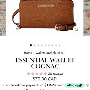 Brand new!Poppy and Peonies wallet crossbody w/ tassel. Gorgeous cognac colour.